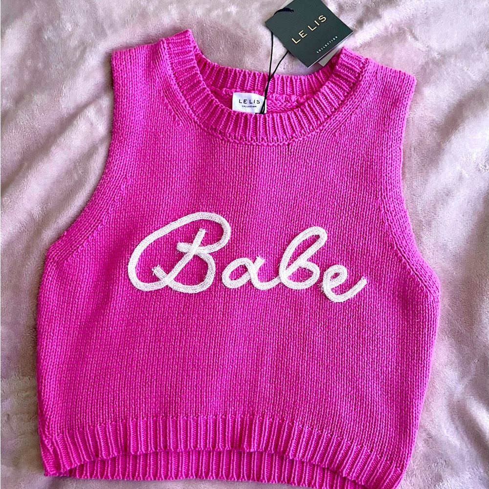 Fantastic knit sleeveless sweater. NWT